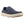Blue canvas slip-on moccasin by Korkers with tan stitching, 'K' logos, plaid lining, and a thick white and tan sole.