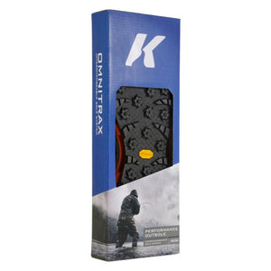 Black and yellow Vibram XS Trek Sole by Korkers, with a textured pattern and Vibram logo, displayed in a blue box featuring a 'K' logo and a fishing image.
