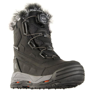 Black fur-trimmed winter boots by Korkers, with a Boa lacing system, visible 'WATERPROOF' and 'Thinsulate' labels, and a rugged sole.
