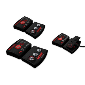 Black rcB 1200 battery packs by Lenz in three sets, one connected to a small charging clip.