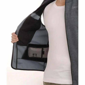 Dark grey heat vest by Lenz, open to show inner pockets with a battery pack, worn over a white t-shirt.