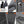 Men's gray heated jacket by Mobile Warming, with zippered vents, multiple pockets, mesh liner, and adjustable cuffs.
