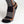 Men's gray, black, and orange heated knit sock by Mobile Warming featuring varied textures, a diamond pattern, and orange stripes, side view.