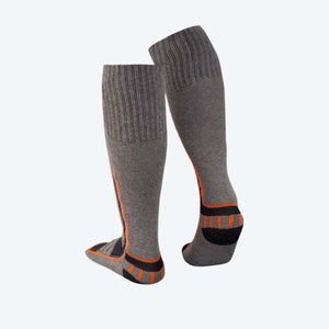 Pair of grey merino heated socks by Mobile Warming, with orange and black striped accents and ribbed cuffs, standing upright.