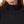 Black women's 1/4 zip long sleeve shirt by Mobile Warming, featuring a ribbed collar and textured shoulders.
