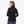 Black women's Element Mid-Layer 1/4 zip long sleeve heated shirt by Mobile Warming, with a ribbed texture and mock neck, viewed from the back on a model wearing blue jeans.