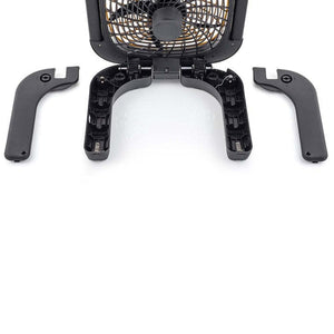 10-inch black battery camping fan by Treva with its base disassembled, showing open battery compartments and detached legs.