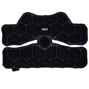 Black textured knee pad by Onyx Cool with a honeycomb pattern and central circular detail.