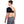 Black textured shoulder wrap by Onyx Cool with ONYX logo, secured with adjustable straps, worn by a man from the back view.