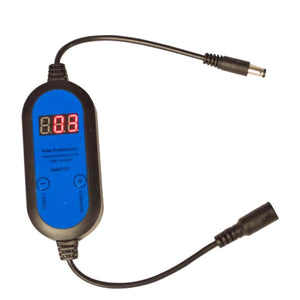 Black and blue programmable digital timer by Polar Products, with a red LED display, adjustment buttons, and DC connectors.