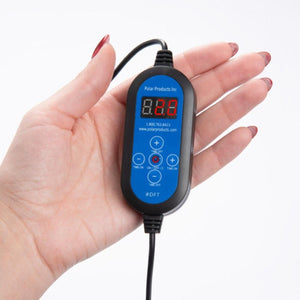 Black and blue digital controller for a cold therapy system by Polar Products, with a red digital display and control buttons, held in a hand with red nail polish.