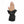 Black heated women's mitten by Seirus, featuring a control button on the wrist, shown with a bare hand inserting.