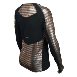 Women's long sleeve base layer top by Seirus, black with metallic bronze patterned panels featuring fine wavy horizontal lines, shown from an angled back view.