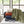 Twin heated blanket by Serta, soft and fluffy, in stacked white, rust, navy, gray, plus draped olive green, with two controllers.