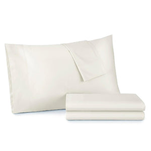 Cream twin cotton percale sheet set by Shavel, featuring one pillowcase and two neatly folded sheets on a white background.
