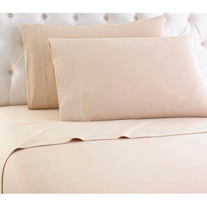 Twin Micro Flannel light beige sheet set by Shavel with two stacked pillowcases and a flat sheet.