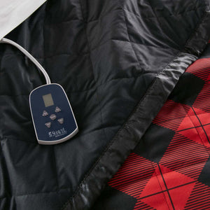 Red and black buffalo check electric blanket by Shavel, reversible with a quilted black side and its control unit.