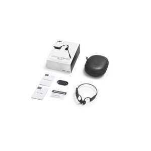 Black OpenComm 2 headset by Shokz, unboxed with its white retail packaging, black carrying case, charging cable, and accompanying documents.