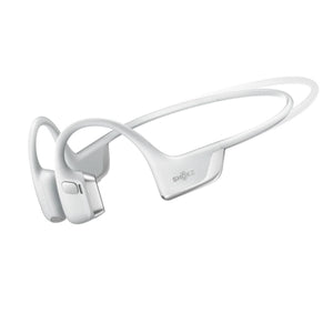 White mini headphone by Shokz, with an over-ear band design and visible controls on the right ear hook, shown from a side view.