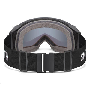 Black frame ski goggles with a green mirror lens by Smith Optics, featuring multi-layered gray foam padding and an adjustable elastic strap.