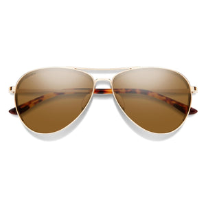 Gold frame aviator sunglasses with brown ChromaPop polarized lenses by Smith Optics and tortoise shell temple tips.