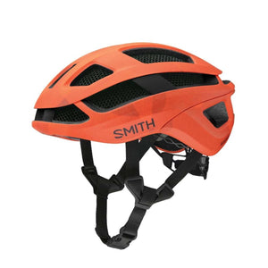 Orange bike helmet by Smith Optics, with black vents, internal mesh lining, and a subtle geometric pattern, shown from a side view.