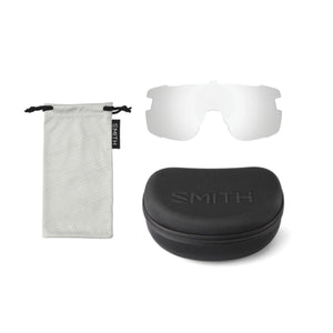 Matte black frame sunglasses with clear-to-gray lenses by Smith Optics, shown with a white 'SMITH' pouch, a clear replacement lens, and a black 'SMITH' hard case.