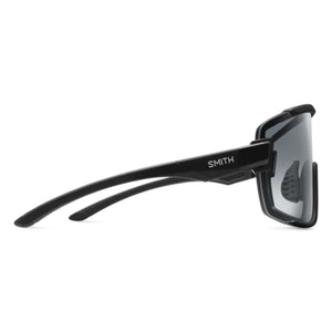 Matte black sunglasses with ChromaPop photochromic clear to gray lenses by Smith Optics, shown from the side with an athletic wraparound style.