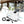 White patio misting system pump by The Patio Misting System, displayed with connected lines, an inset nozzle diagram, and a misty patio.