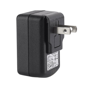 Black textured USB power adapter by Therm-ic with foldable US-style electrical prongs, shown from a side view.