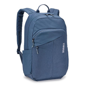 Slate blue backpack by Thule featuring a textured lower front panel, multiple zippered pockets with rope pulls, and a side pocket.