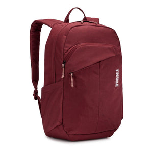 Maroon laptop backpack by Thule, shown at an angle with padded shoulder straps and multiple zippered compartments.
