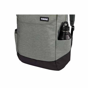 Greenish-grey laptop backpack by Thule with a black base, a Thule logo patch, and a black water bottle in a side pocket.