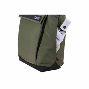 Olive green tote bag by Thule with a black base, featuring a white umbrella in the side pocket.