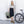 Olive green and black commuter backpack by Thule, held by a person standing next to a bicycle.