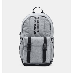 Grey heathered laptop backpack by Under Armour with black logo, two buckled front straps, and a black base.