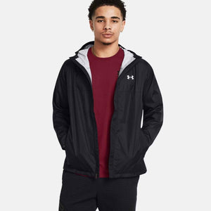 Black men's hooded jacket by Under Armour, featuring a white logo and light grey hood lining, worn over a maroon tee.