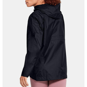 A black Women's Cloudstrike Shell Jacket by Under Armour, hooded and shown from a side-back view with pink pants.