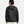 Black hooded jacket by Under Armour, shown from the back on a model with braided hair.