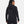 Black Women's Tactical Softshell Jacket by Under Armour, with a hood, seen from the back.