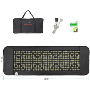 Black 24x70 inch full-body infrared heating pad by UTK Technology, featuring visible jade, tourmaline, and magnet stones, shown with a carry bag, controller, and box.