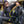 Black quilted waterproof diving vest by Venture Heat, worn by a woman with diving gear outdoors.