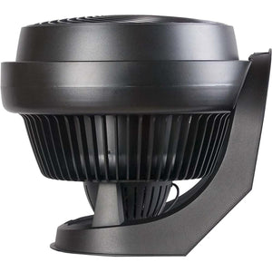 Sleek black full-size whole room air circulator fan by Vornado with a spiral-patterned top and vertical grilles, side view.