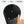 Black small air circulator tower fan by Vornado with blue glowing touch controls, a finger interacting, and an oscillation arrow.