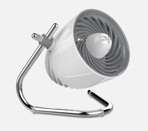 White personal air circulator by Vornado with a grey swirling grille on a chrome U-shaped stand, angled upwards.