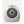 A light gray whole room heater by Vornado with a circular front grille displaying the brand logo.