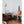 Black vintage whole room heater by Vornado with a circular grill and a metal stand.