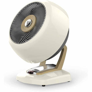 Cream vintage heater by Vornado with a gold stand and silver grille featuring a gold medallion with 'WHOLE ROOM' text.