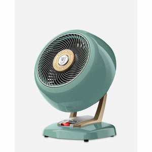 Vintage whole room heater by Vornado in teal with gold and silver-tone accents, showing a red power light.