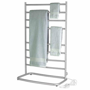Silver freestanding electric towel warmer by WarmRails holding three light green towels, with a visible power cord.